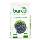 A 1kg bag of Burcol dry black beans with white and green packaging on a white background