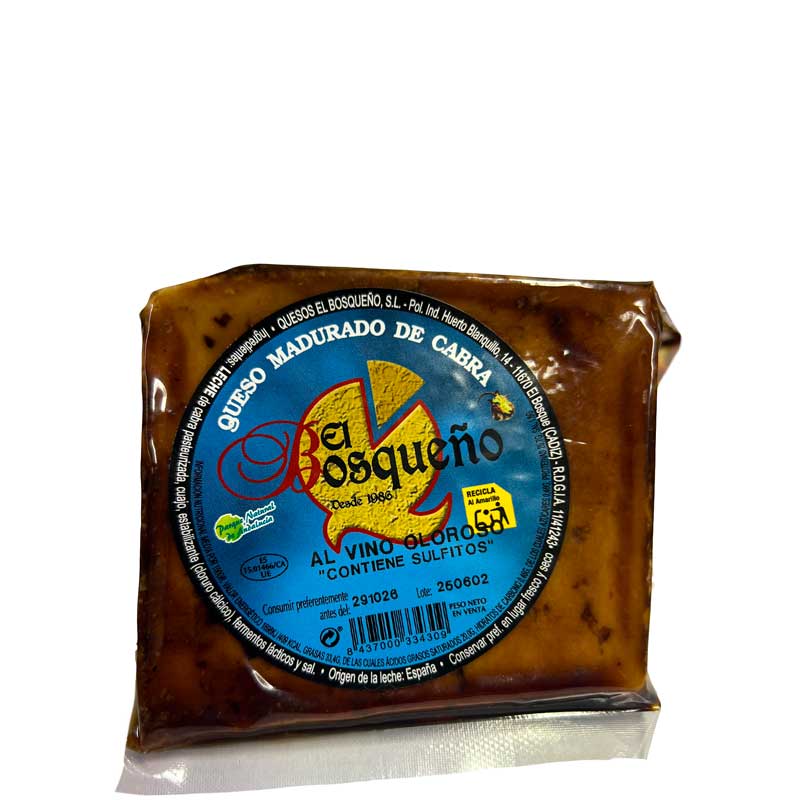 A portioned piece of El Bosqueño Payoya's Goats Cheese with Olorosso Sherry on a white background