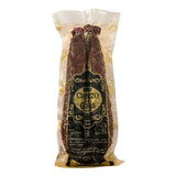 A vacuum-sealed package of Entrepenas Chorizo de Leon in a U shape with a distinct black and gold label on a plain white background.