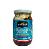 A jar of La Arteanal Mexican Salsa Macha Chilli Oil with honey and cranberries - the jar has an attractive blue label and it's on a white background