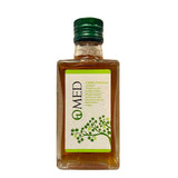 A 250ml bottle of O-Med Cider Vinegar in an attractive square glass bottle with an apple tree design on the label
