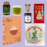 A collage of Ping Coombes recipe book 'Rice' with a gift set of ingredients used in the book, arranged on a solid blue background.
