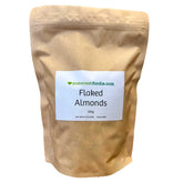 Somerset Foodie 500g Kraft bag of flaked almonds with a label on a white background