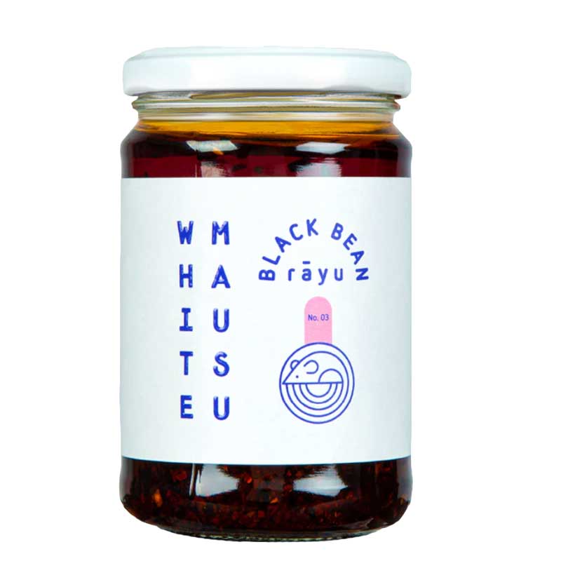 A 240g jar of White Mausu Black Bean Rayu with a white label with blue writing on a white background