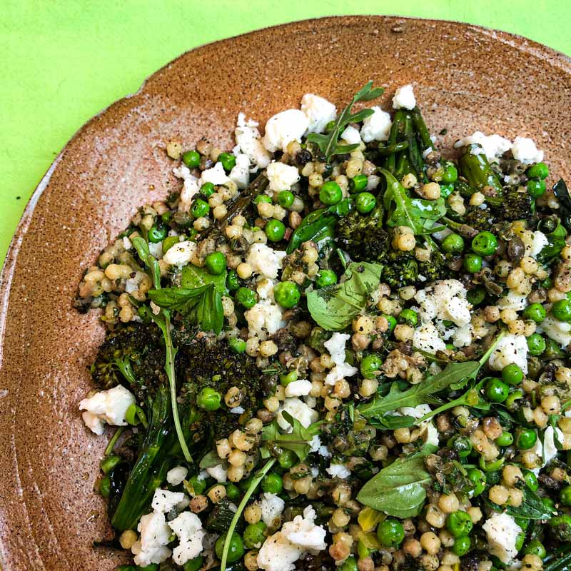 Fregola with Salsa Verde, Goats Cheese, Broccoli and Peas