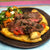 Rib Eye Steak with Chimichurri, Flat Breads, Tomato and Onion Salad