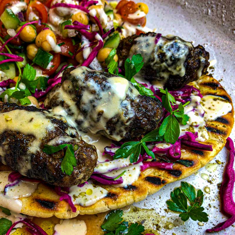 Baharat Spiced Lamb Kofta with Pickled Red Cabbage and Tahini Sauce