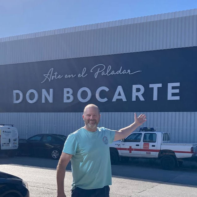 Somerset Foodie Ben standing outside the Don Bocarte Cantabrian Anchovy Factory in Northern Spain on a sunny day