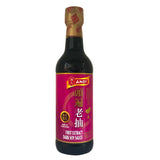 Bottle of Amoy First Extract Dark Soy Sauce on a white background