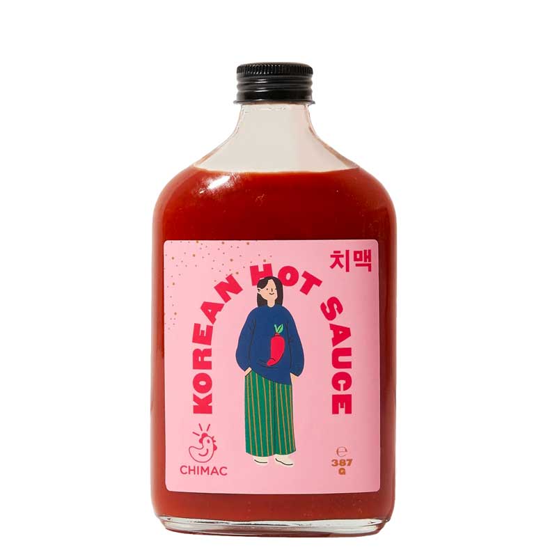 A bottle of Chimac Korean Hot Sauce with a pink label on a white background