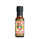 A 125ml bottle of La Chipotlera Salsa Ruda featuring a colourful and serreal illustration of a female Mexican wrestler
