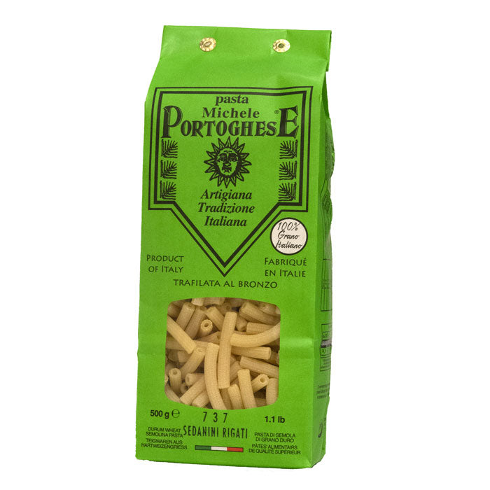 A 500g bag of Michele Portoghese Sedanini Rigati pasta with attractive green packaging on a white background