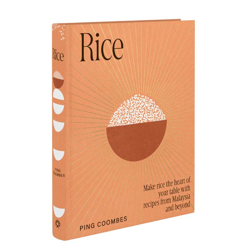 A picture of the cook book called Rice by Ping Coombes showing a terracotta coloured cover with an illustration of a bowl of rice.