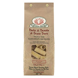 A 500g bag of Rustichella d'Abruzzo durum wheat pasta, featuring a natural brown kraft paper packaging with a clear window showing the dried pasta inside.