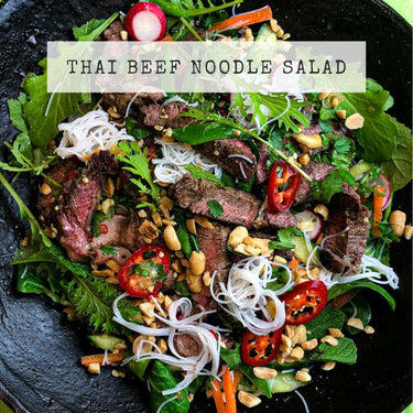Recipe for Thai Beef Noodle Salad; grilled strips of beef with rice noodles, salad leaves, fresh chilli, in a Thai dressing.